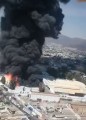 Atienden gran incendio en zona industrial de Ecatepec